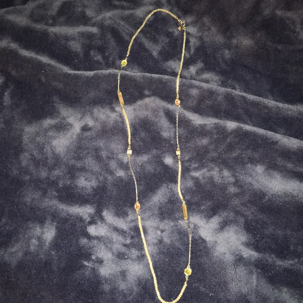 Long gold chain and bead necklace